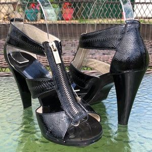 Micheal Kors shiny patent leather zip up heels